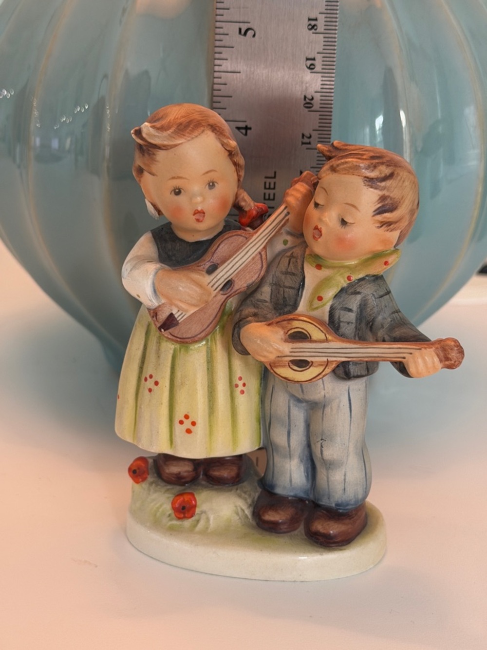 Hummel Figurine Pair in Pastel Green, Blue, Brown and Cream
